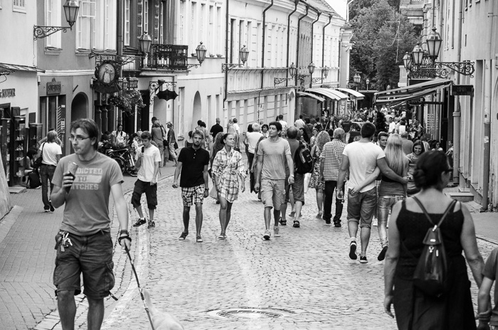 Pilies Gatve, the main tourist street in Vilnius. Also: the guy on the left may or may not be wearing a shirt that says "addicted to bitches". We may never know.
