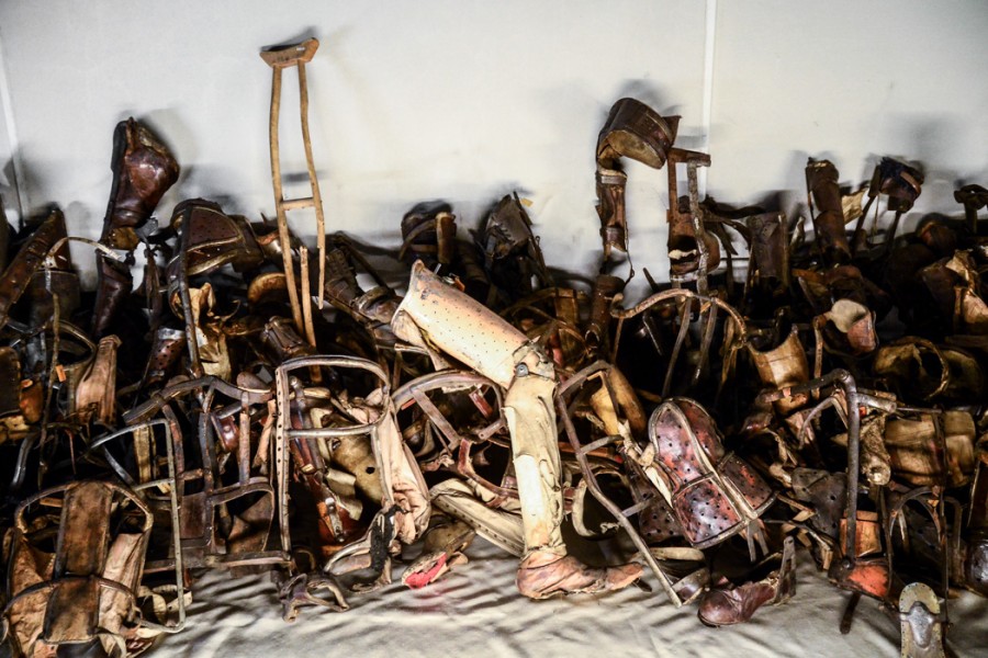 Crutches, prosthetic limbs and other items collected from people that were likely sent directly to the gas chambers after "selection" at Auschwitz-Birkenau.