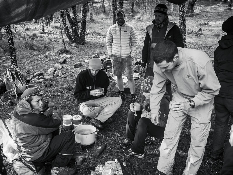 Backpackers having breakfast at camp on Tajumulco.