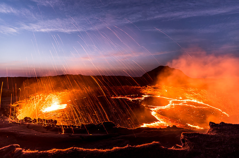 Lava lake of Erta Ale volcano in Ethiopia. Backing up photos while backpacking - GreatDistances / Matt Wicks