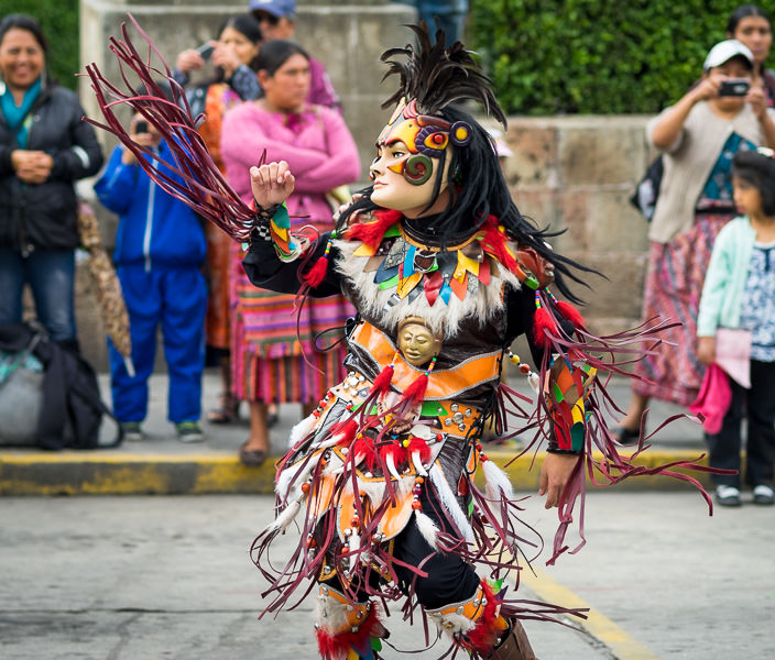 Masked dancer in Guatemala independencia parade. Guatemalan Independence & Xela Feria 2014 - GreatDistances / Matt Wicks