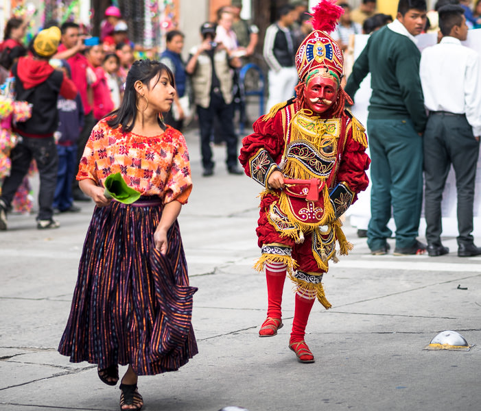 Masked dancer in Guatemala independencia parade. Guatemalan Independence & Xela Feria 2014 - GreatDistances / Matt Wicks