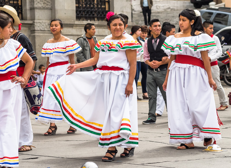 Girls in traditional clothing in a Guatemalan independence parade. Guatemalan Independence & Xela Feria 2014 - GreatDistances / Matt Wicks