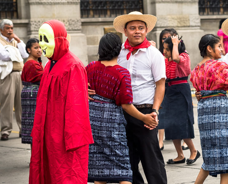Dancers and a ghost in a Guatemalan independencia parade. Guatemalan Independence & Xela Feria 2014 - GreatDistances / Matt Wicks