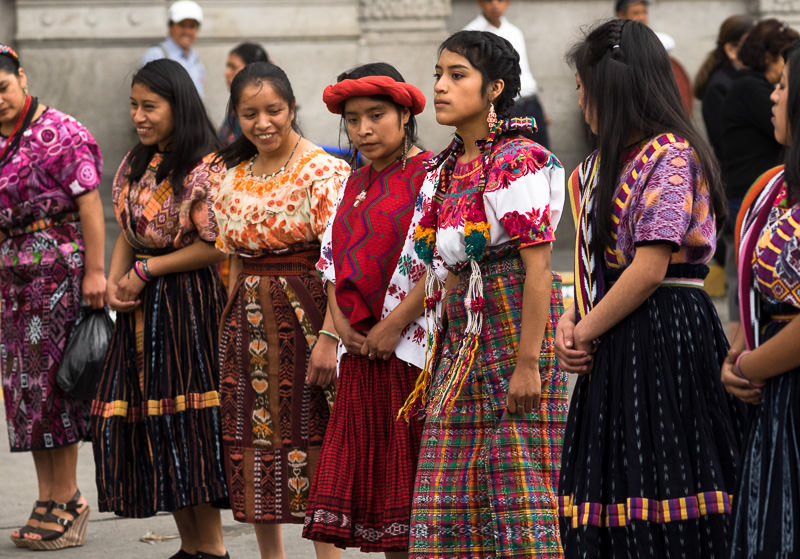 Girls in traditional Guatemalan clothing in a Guatemalan independence parade. Guatemalan Independence & Xela Feria 2014 - GreatDistances / Matt Wicks