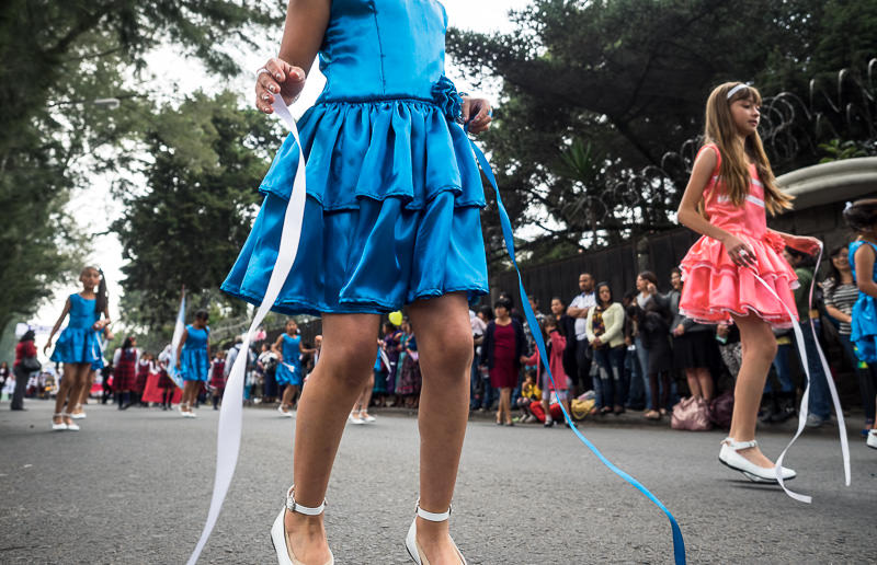 Girls in a Guatemalan independence parade in Xela. Guatemalan Independence & Xela Feria 2014 - GreatDistances / Matt Wicks