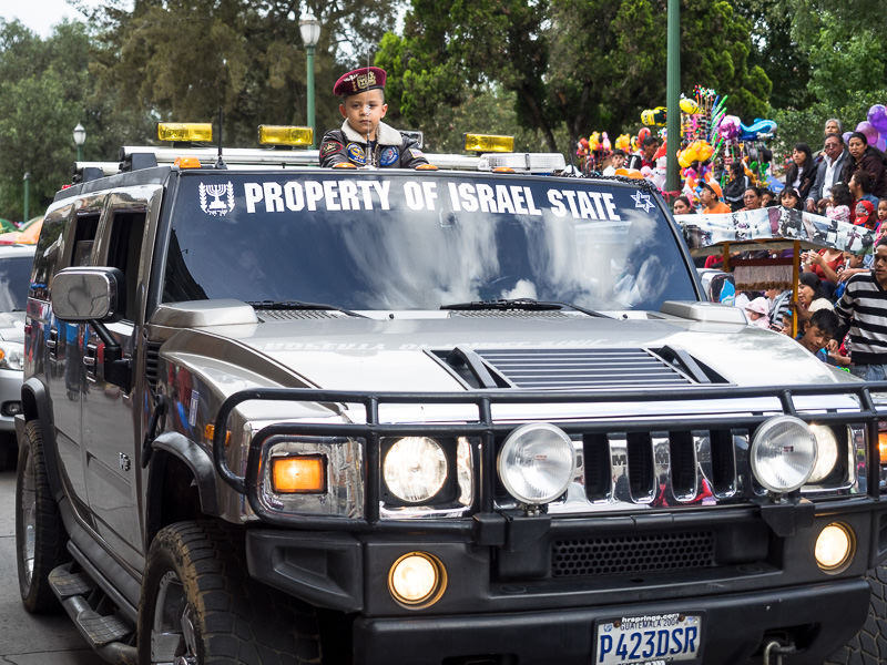 Humvee in an independence day parade in Xela, Guatemala. Guatemalan Independence & Xela Feria 2014 - GreatDistances / Matt Wicks