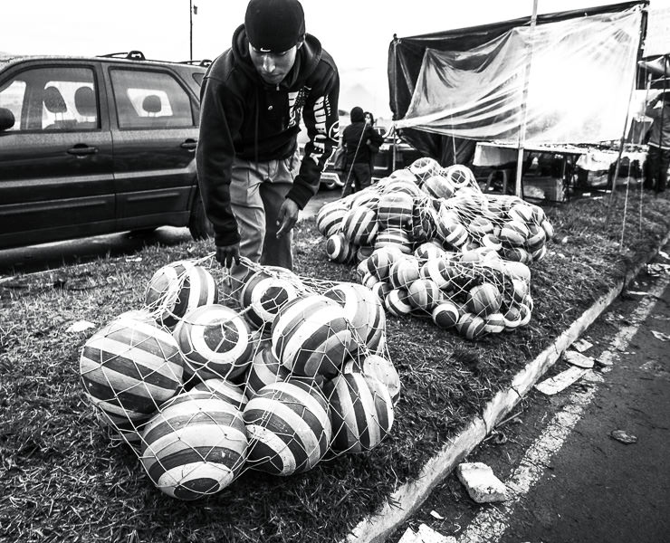 Balls for sale on the side of the road at Xela Feria in Quetzaltenango, Guatemala. Guatemalan Independence & Xela Feria 2014 - GreatDistances / Matt Wicks