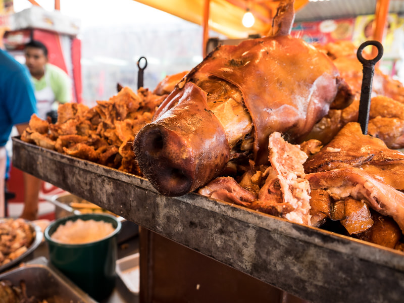 Pork at Xela Feria in Quetzaltenango, Guatemala. Guatemalan Independence & Xela Feria 2014 - GreatDistances / Matt Wicks