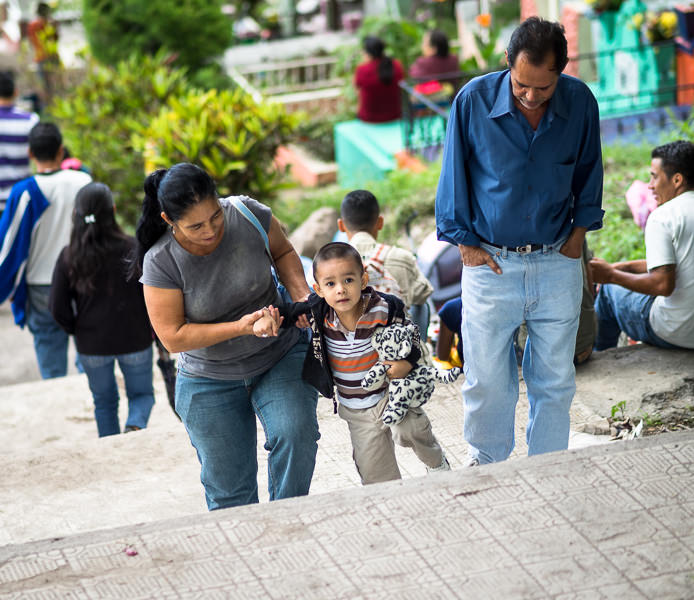 A family walks up stairs in Matagalpa's cemetery on Day of the Dead. GreatDistances / Matt Wicks