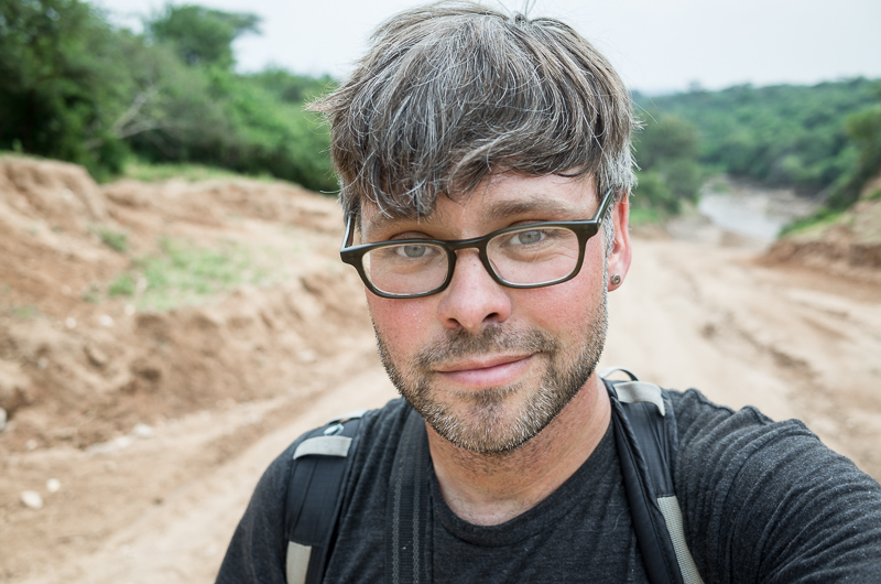 here I am in 2015, near the village of Kolcho, in southern Ethiopia, just after our minibus got completely stuck in a river and had to be pulled out of said river by Karo tribesmen that would go on to point their AK-47 in the face of our driver as they demanded an exorbitant fee for towing. Travel's good for stories if nothing else! GreatDistances / Matt Wicks