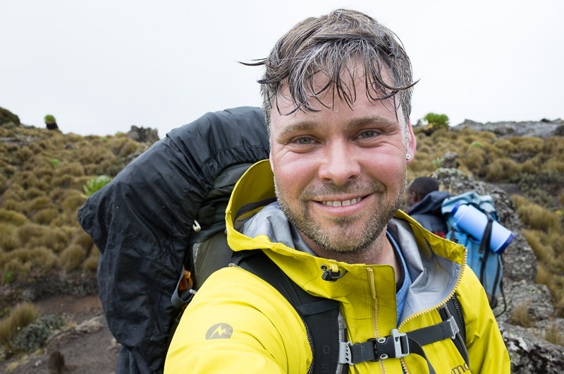 Soaked and cold and trying hard to smile on Likii North trail on Mount Kenya. GreatDistances / Matt Wicks