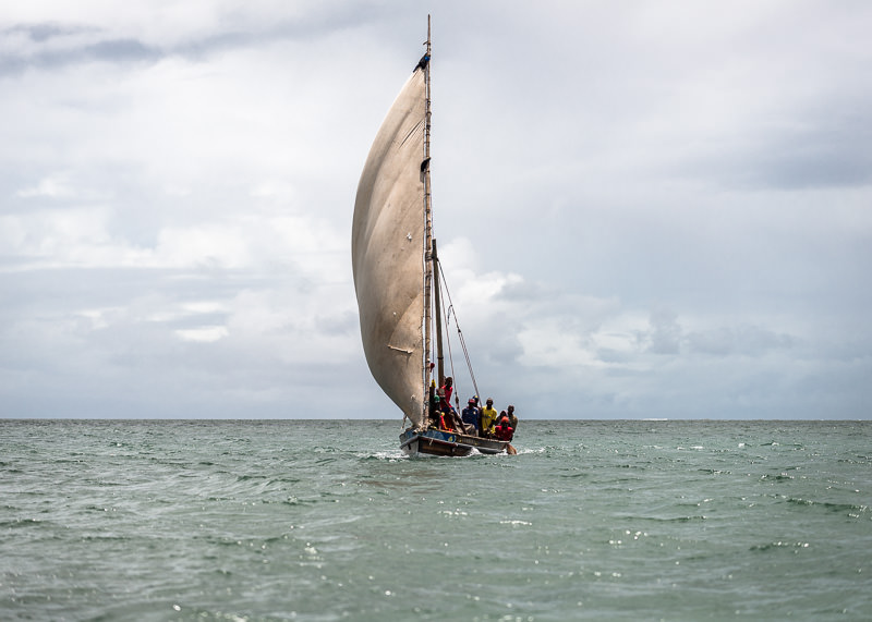 A dhow with full sails off the coast of Kenya near Lamu. GreatDistances / Matt Wicks