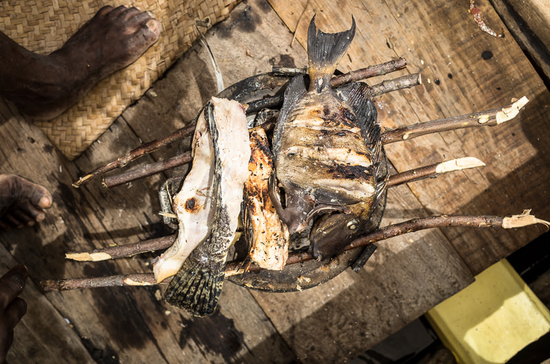 An amazing lunch in progress - fresh fish caught via spearfishing and barbecued aboard our dhow.  GreatDistances / Matt Wicks