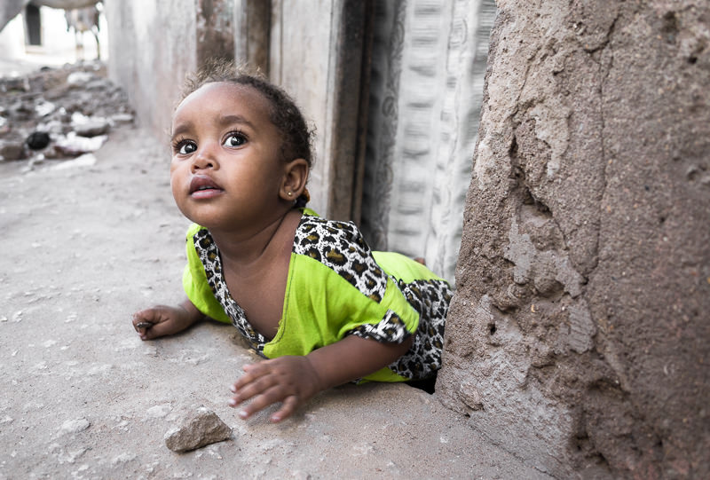street portrait of a young girl in Lamu, Kenya. GreatDistances / Matt Wicks